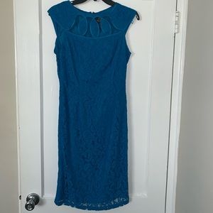 Worn once, beautiful color with top cutouts